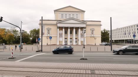 Moving-vehicle-traffic-during-daytime-in-Germany-with-House-of-History-in-background