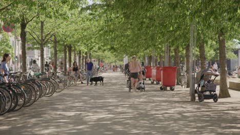 People-enjoying-the-outdoors-on-a-sunny-day-at-Tivoli-Gardens-in-Copenhagen