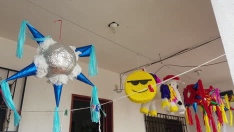 piñata's-hanging-from-the-roof,-ready-to-be-used