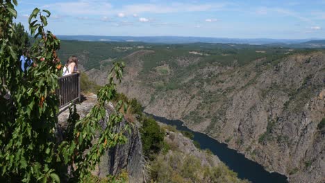 Tourists-savouring-the-view-of-the-Ribeira-Sacra-in-Spain,-pan-right