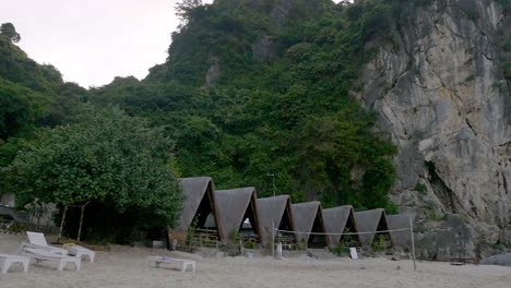 The-Beautiful-Green-Scenery-Of-The-Forest-And-The-Rocky-Limestone-Formation-By-The-Ha-Long-Bay,-Vietnam---Wide-Pan