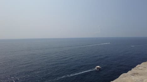 View-of-the-open-sea-from-the-coastal-side-of-Dubrovnik,-Croatia,-capturing-the-concept-of-serene-coastal-beauty-and-endless-horizon