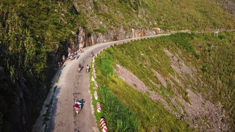 Aerial-view-of-motorcyclists-all-over-the-road-on-the-Northern-Loop,-Ma-Pi-Leng-Pass