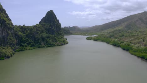 beautiful-landscape-of-hills,-rocks-structures-and-river-on-an-island-in-the-south-pacific-ocean-during-the-day