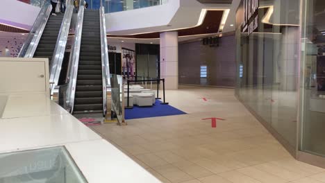 Empty-closed-retail-stores-at-a-shopping-mall-after-COVID-pandemic-hit