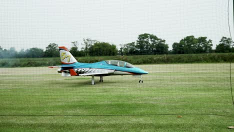 Radio-controlled-model-jet-is-preparing-for-taking-off-from-runway