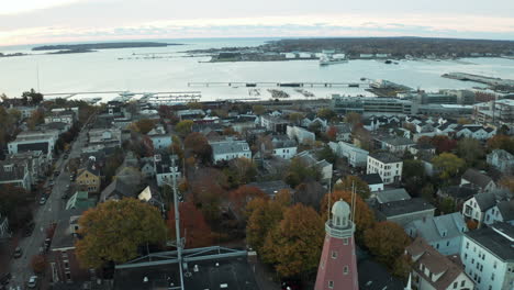 Flying-over-Portland-residential-area-with-observatory,-toward-port