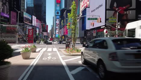 POV-shot-riding-with-a-bicycle-on-the-empty-streets-of-New-York-City-near-Times-Square