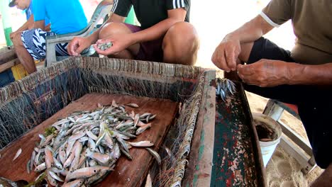 Fisherman-Prepares-Hooks-In-Basket-For-Longline-Fishing