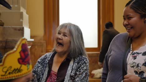 Native-Americans-at-the-Ute-flag-tribute-at-the-Denver-Capitol-building-shake-hands-at-the-ceremony