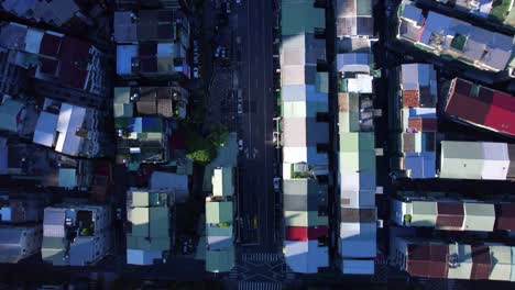 Straight-down-over-residential-streets-in-Taipei,-Taiwan---early-morning