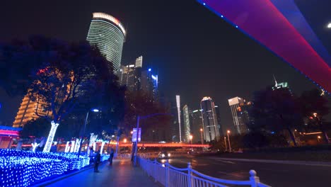 Illuminated-skyscrapers-and-downtown-traffic-of-Shanghai-business-center