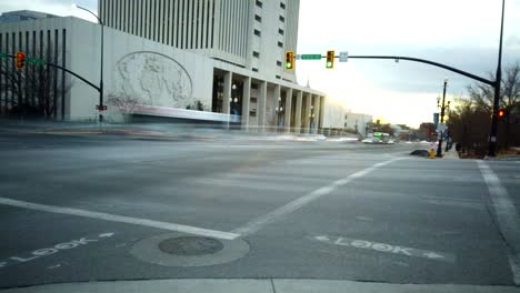 A-blurred-traffic-stop-in-downtown-Salt-Lake-City,-Utah-right-in-front-of-the-LDS-Church-office-Building-headquarters