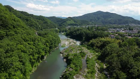 Flying-over-stunning-natural-Nagatoro-River-valley-in-Chichibu,-Saitama-near-Tokyo