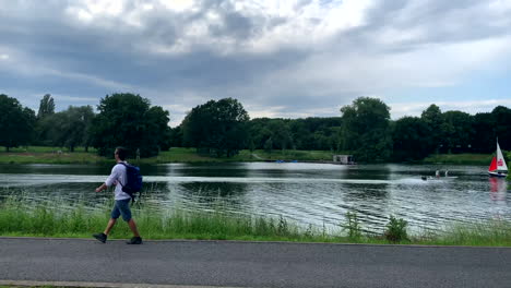 Small-motor-boat-drives-on-the-Aasee-lake-in-Muenster