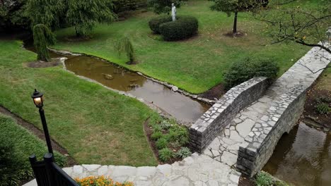 Buffalo-Trace-bourbon-distillery-grounds-slow-tilt-to-water-tower