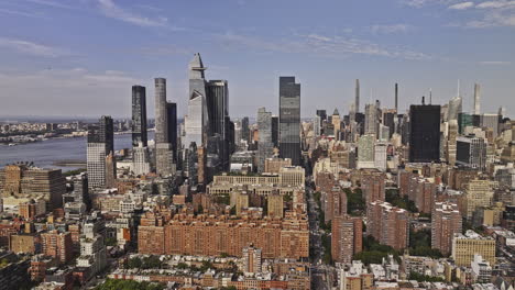 NYC-New-York-Aerial-v451-panning-views-flyover-Chelsea-capturing-Midtown-Manhattan-skyscrapers-cityscape,-waterfront-parks-and-Hoboken-across-Hudson-river---Shot-with-Mavic-3-Pro-Cine---September-2023