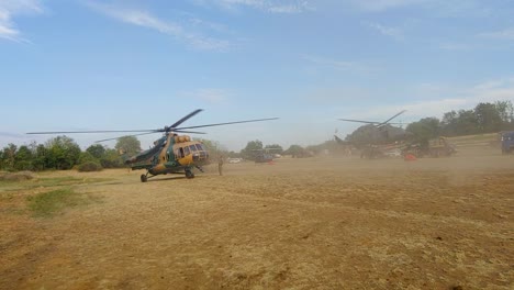 Right-helicopter-taking-off-with-empty-water-tank-to-go-fight-forest-fire