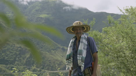 Farmer-tends-to-his-crops-amidst-lush-green-plants-in-the-fertile-plains-of-Llanos-Orientales,-showcasing-the-beauty-and-bounty-of-the-region