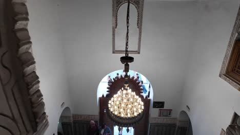 Inside-Medresa-Ben-Youssef-historic-Islamic-college-in-Marrakesh,-Morocco