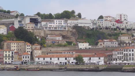 A-View-of-Calem-Winery-in-Porto,-Portugal-from-the-other-side-of-the-River