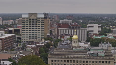 Trenton-New-Jersey-Aerial-v9-zoomed-low-flyover-downtown-district-capturing-State-Capitol-Building-Complex,-urban-cityscape-and-views-of-Delaware-river---Shot-with-Mavic-3-Pro-Cine---September-2023