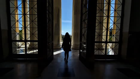 Woman-walking-out-of-the-Zappeion-Hall-Convention-Center