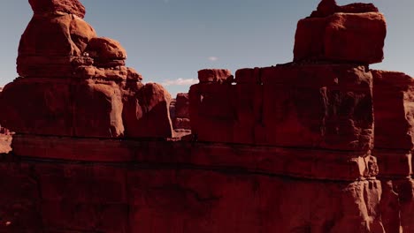 Aerial-Drone-fly-through-rock-pinnacles-to-reveal-beautiful-Utah-Valley-of-the-Gods