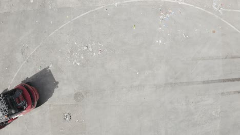 Top-view-of-wheel-loader-working-on-waste-treatment-plant-of-France