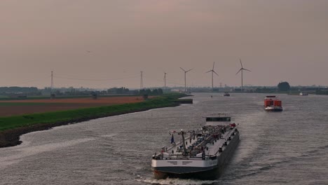 Hollands-Diep-River,-vessels-sailing,-bulk-goods-supply-transportation