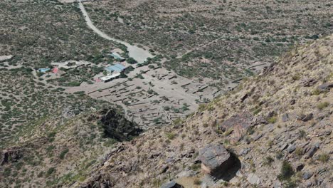 Aerial-Drone-Shot-Of-Ancient-Ruins-Tourist-Landmark-In-Tucuma-N,-Ciudad-Sagrada-De-Quilmes