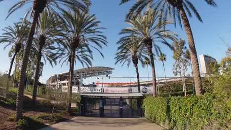 Sunny-day-at-Dignity-Health-Sports-Park-with-lush-palm-trees-in-Carson,-California