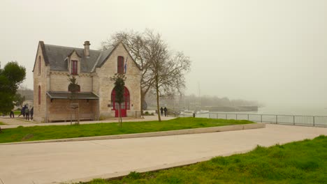 Traditional-French-Architecture-On-A-Misty-Morning-In-La-Rochelle,-France