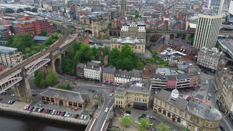 Newcastle-upon-tyne,-showcasing-historic-buildings-and-bridges-over-the-river,-aerial-view