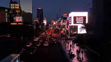 Busy-Night-Traffic-on-Las-Vegas-Strip,-Cars-and-Lights,-Static-View-From-Pedestrian-Bridge