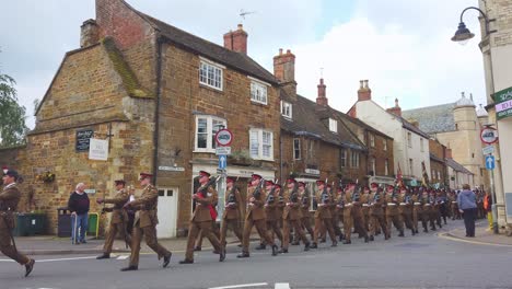 UK-soldiers-of-the-Royal-Anglian-regiment,-also-known-as-"The-Poachers"-marching-to-a-parade-in-Uppingham-in-the-UK-county-of-Rutland