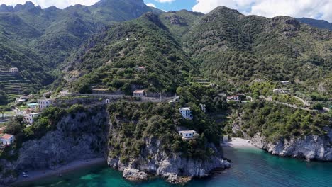 Panoramic-Aerial-Perspective-of-Italy’s-Amalfi-Coast,-Encircled-by-the-Tyrrhenian-Sea,-Verdant-Mountains,-and-Rich-Flora,-Europe