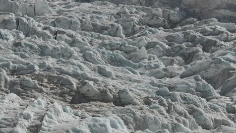 Drone-shot-of-Khumbu-Glacier-at-Everest-Base-Camp,-Nepal,-showcasing-majestic-ice-views