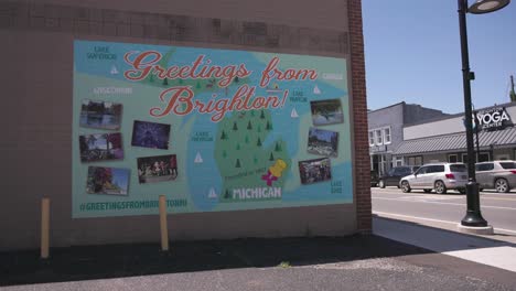 Greetings-from-Brighton,-Michigan-mural-with-stable-video