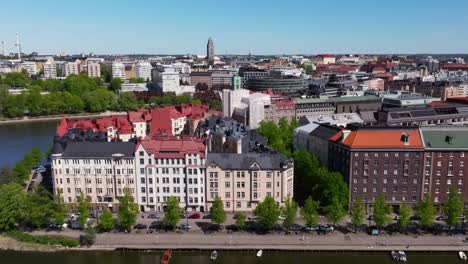 Quaint-classical-architecture-line-waterfront-of-Helsinki-Finland,-aerial-dolly