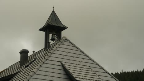 Small-Bell-on-Rooftop-Starts-Ringing-on-Overcast-Day