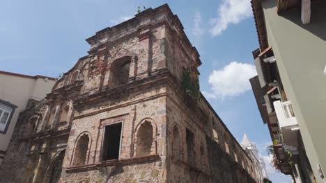 Old-stone-church-facade-in-Casco-Viejo-under-a-bright-blue-sky,-Panama-City