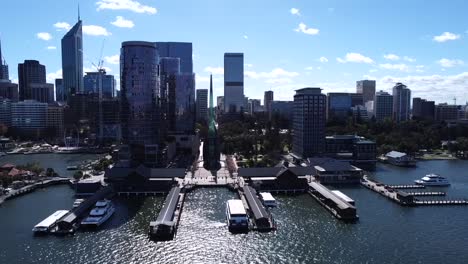 Aerial-view-in-over-Barrack-St-Jetty-and-Swan-Bells---Perth-CBD-and-Swan-River