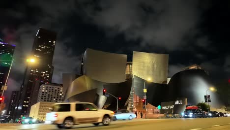 The-Walt-Disney-Concert-Hall-on-Grand-Avenue-in-downtown-Los-Angeles,-California---nighttime-time-lapse