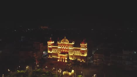 Aerial-drone-shot-of-historical-buildings-light-up-during-night-time-in-Gwalior-city-of-Madhya-Pradesh-India