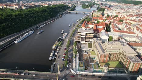 Aerial-view-of-Prague's-old-town-flying-over-bridge