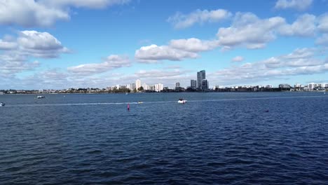 Aerial-drone-ascending-over-Swan-River,-Perth---View-towards-South-Perth