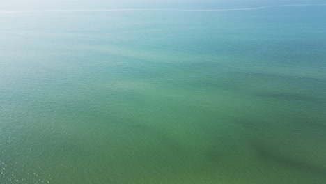 Ever-changing-seascape-of-Nantucket-Sound-captured-by-a-drone-in-Dennis-Port,-Massachusetts