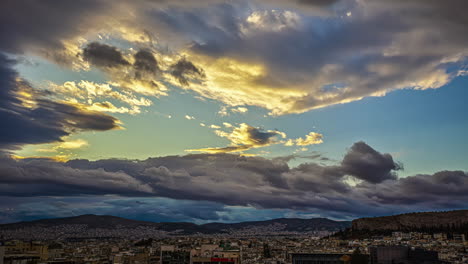 Timelapse-shot-of-illuminated-Acropolis-in-Athens,-Greece-seen-during-evening-time-with-dark-clouds-passing-by