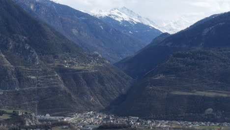 Static-Shot-of-Sion-Valley-Town-and-Snow-Covered-Mountains